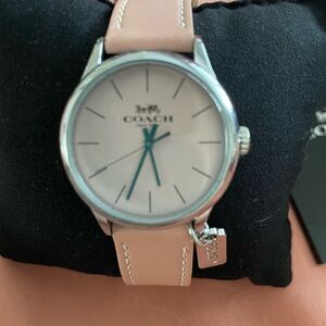 Pink Coach watch.